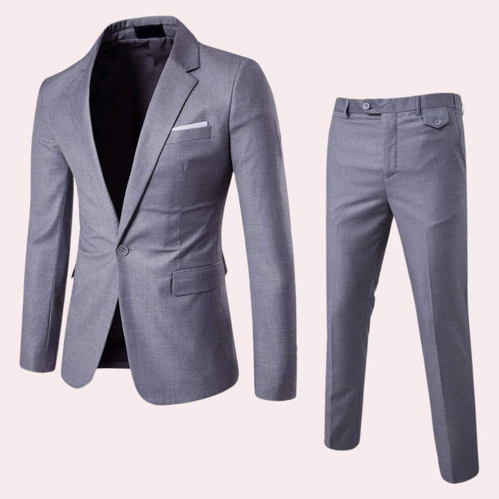 "Elegant rood heren zomerpak met blazer en pantalon, perfect voor formele en semi-formele gelegenheden."