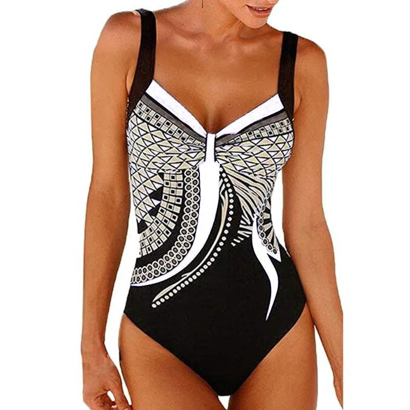 "Elegant zinnia badpak voor dames, met trendy print. Flatterende pasvorm, comfortabel en sneldrogend voor strand of zwembad."
