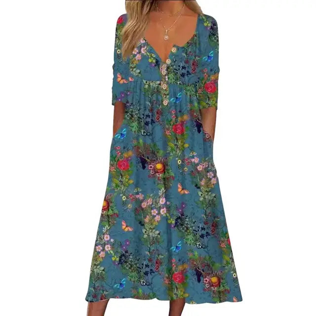 Elegante A-lijn midi jurk met levendige bloemenprint en praktische zakken, ideaal voor zomerse en stijlvolle dagen.