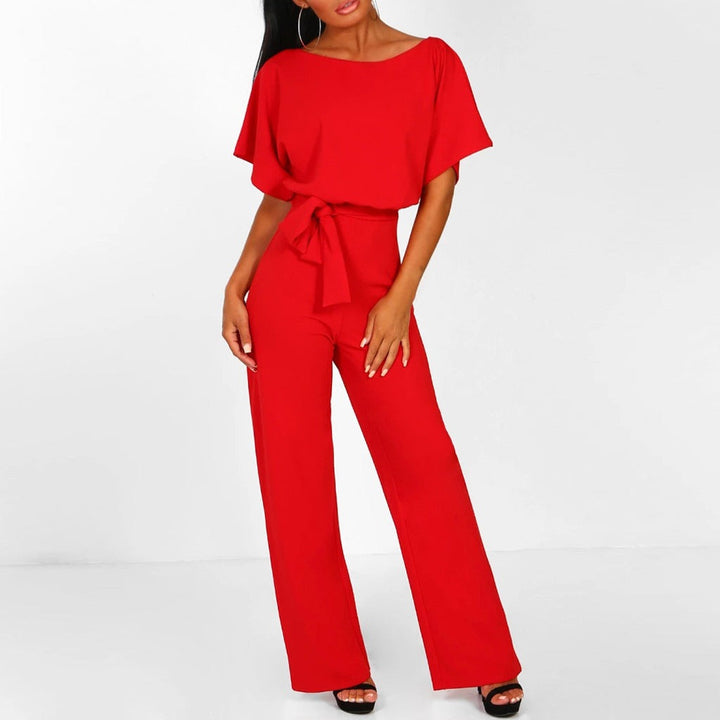 "Elegante Annette jumpsuit met lace-up taille, wijde broekspijpen in zwart. Tijdloze stijl en comfortabel in draagbare stof."