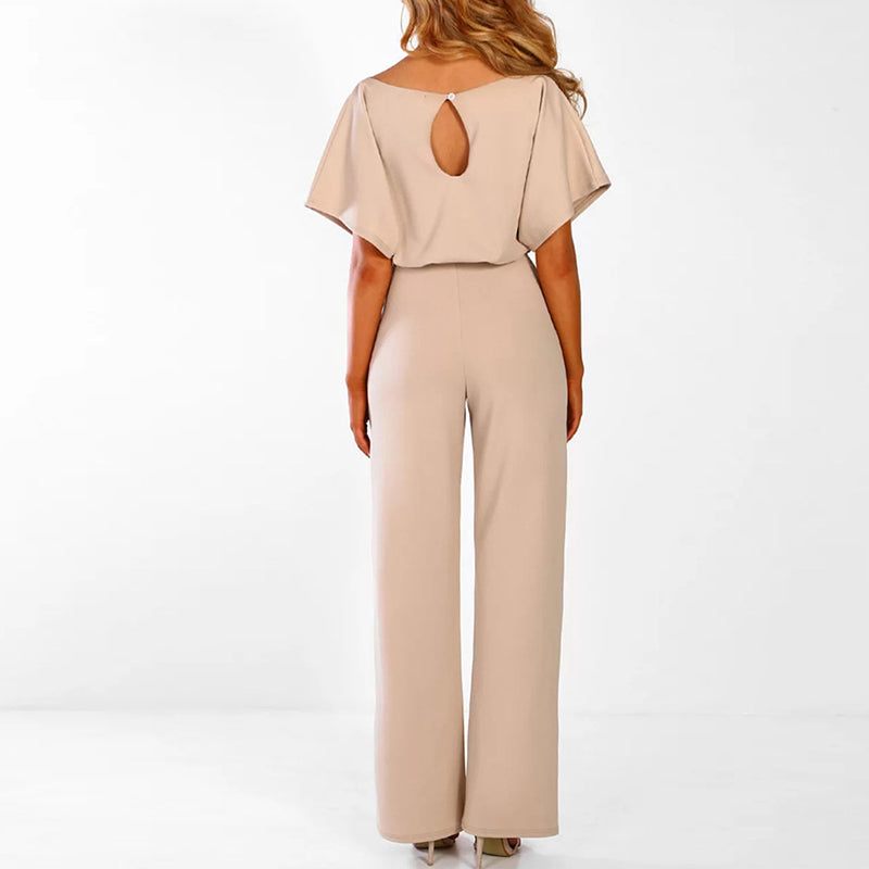 "Elegante Annette jumpsuit met lace-up taille, wijde broekspijpen in zwart. Tijdloze stijl en comfortabel in draagbare stof."