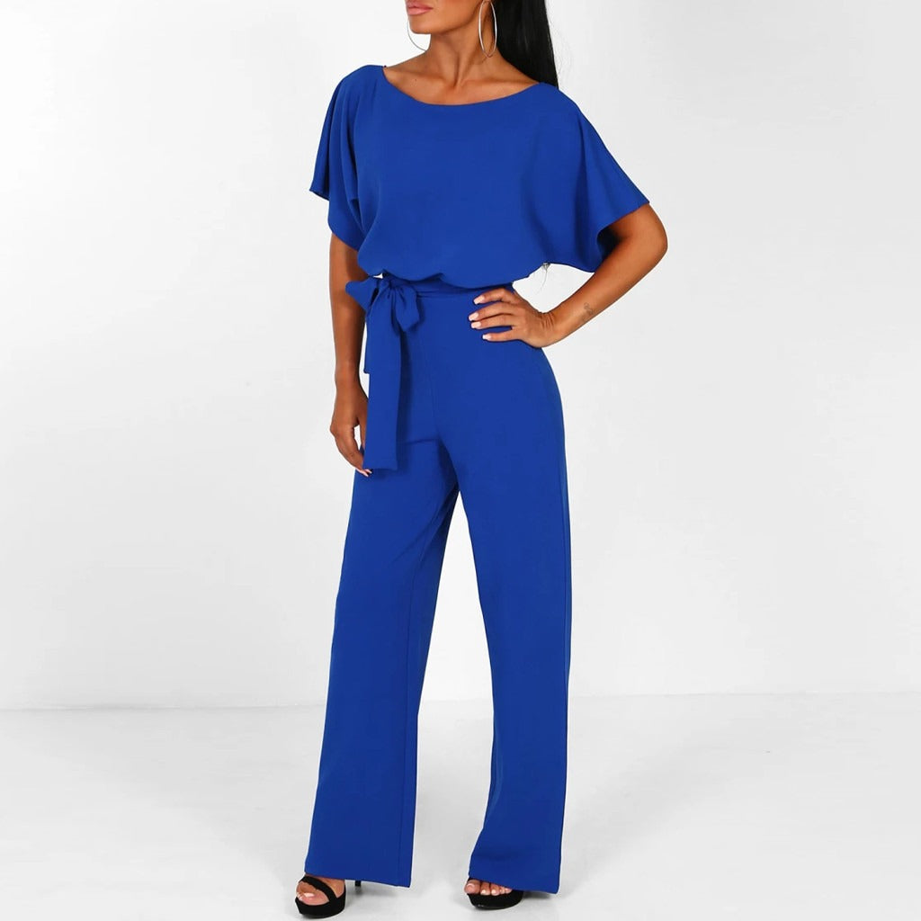 "Elegante Annette jumpsuit met lace-up taille, wijde broekspijpen in zwart. Tijdloze stijl en comfortabel in draagbare stof."