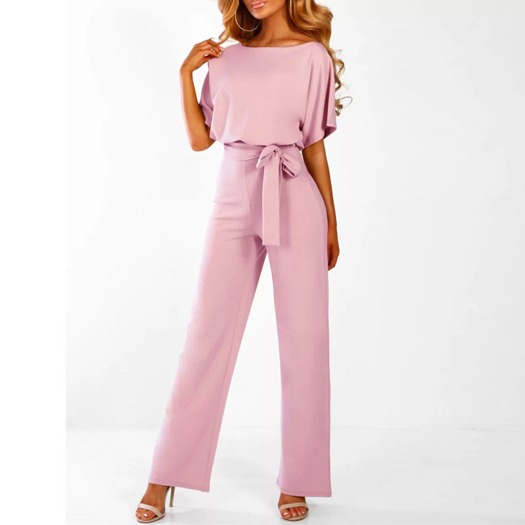 "Elegante Annette jumpsuit met lace-up taille, wijde broekspijpen in zwart. Tijdloze stijl en comfortabel in draagbare stof."