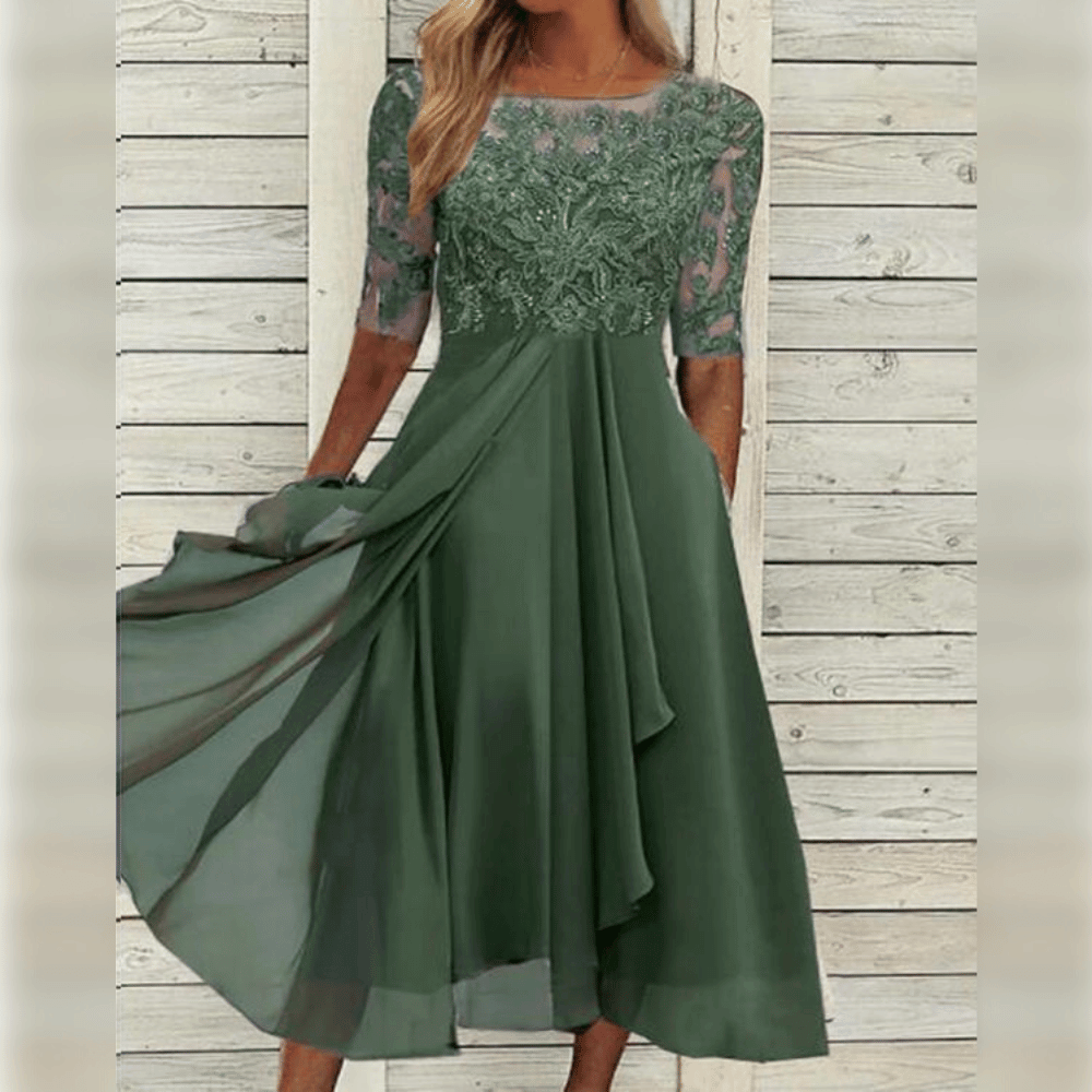 "Elegante avondjurk met kant, halflange mouwen en sierlijk silhouet in lichtgewicht chiffon, perfect voor speciale gelegenhed
