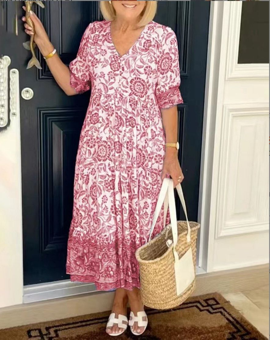 "Elegante bloemen maxi-jurk met V-hals en kleurrijk bloemenpatroon, perfect voor lente en zomer, damesjurken."