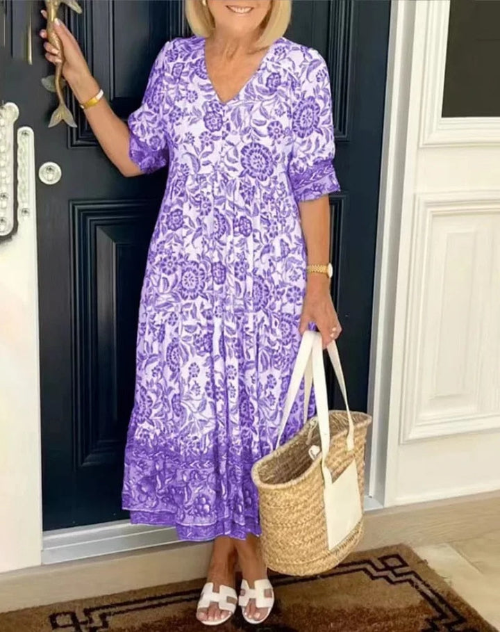 "Elegante bloemen maxi-jurk met V-hals en kleurrijk bloemenpatroon, perfect voor lente en zomer, damesjurken."