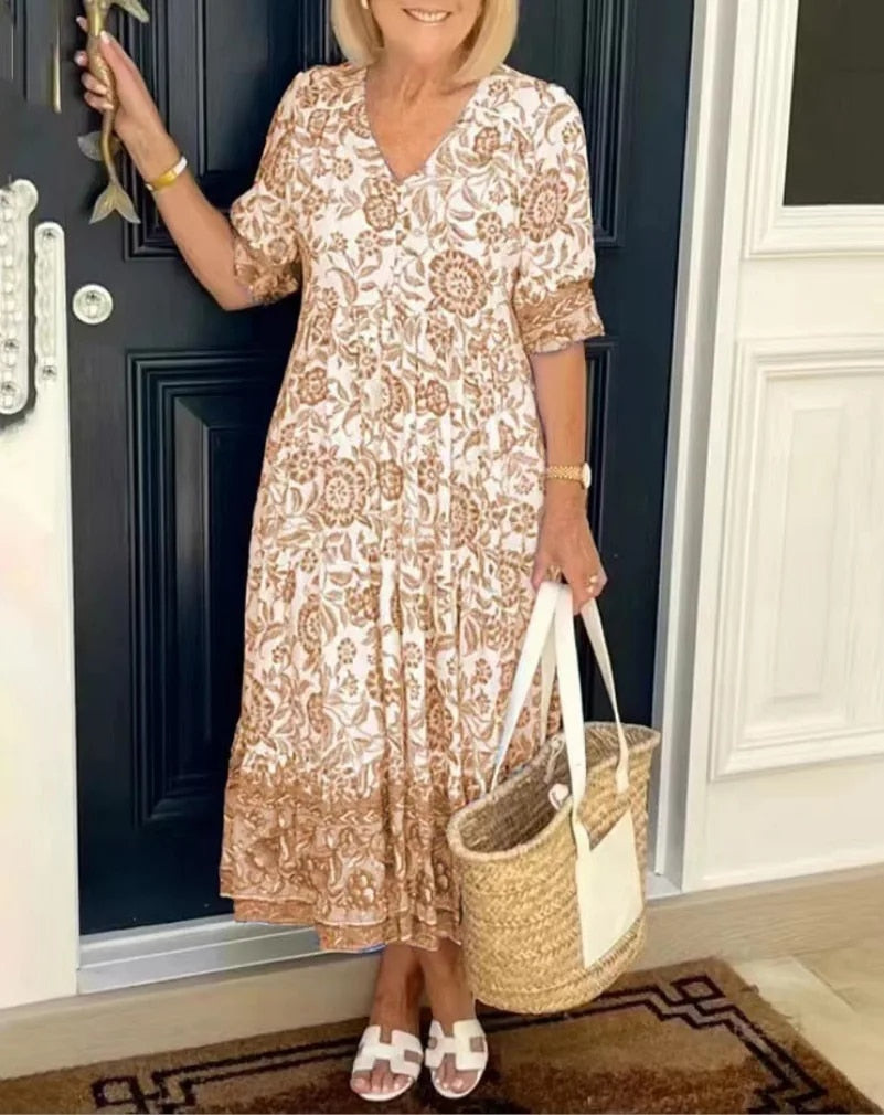 "Elegante bloemen maxi-jurk met V-hals en kleurrijk bloemenpatroon, perfect voor lente en zomer, damesjurken."
