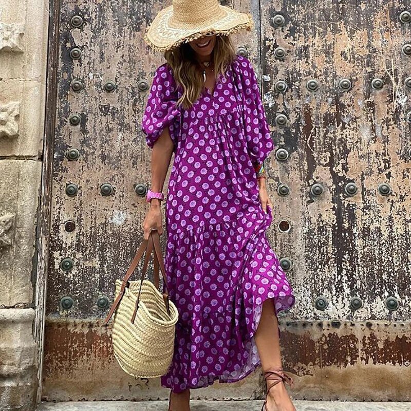 "Elegante bohemian jurk met geometrisch patroon, wijde mouwen, ideaal voor dames, zomers trendy en ademend ontwerp."