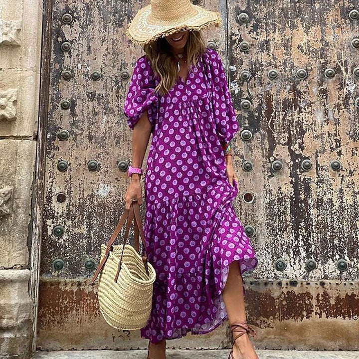 "Elegante bohemian jurk met geometrisch patroon, wijde mouwen, ideaal voor dames, zomers trendy en ademend ontwerp."