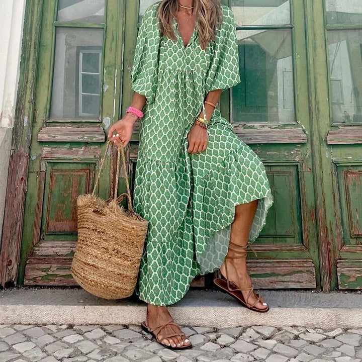 "Elegante bohemian jurk met geometrisch patroon, wijde mouwen, ideaal voor dames, zomers trendy en ademend ontwerp."