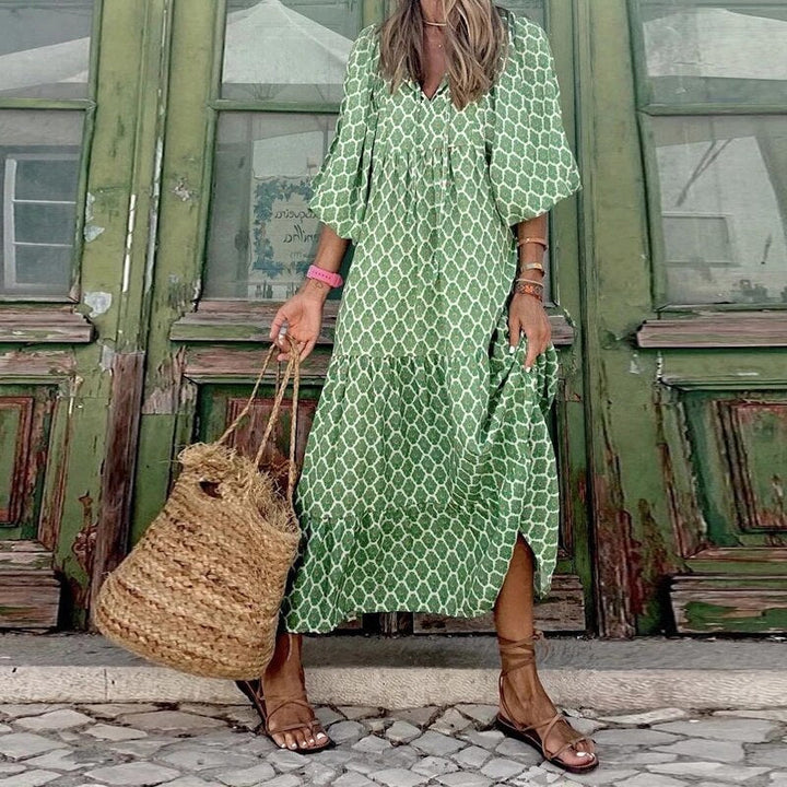 "Elegante bohemian jurk met geometrisch patroon, wijde mouwen, ideaal voor dames, zomers trendy en ademend ontwerp."
