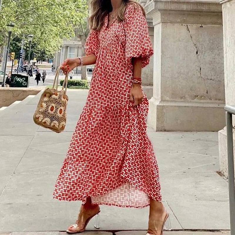 "Elegante bohemian jurk met geometrisch patroon, wijde mouwen, ideaal voor dames, zomers trendy en ademend ontwerp."