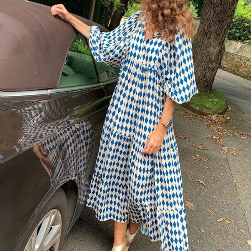 "Elegante bohemian jurk met geometrisch patroon, wijde mouwen, ideaal voor dames, zomers trendy en ademend ontwerp."