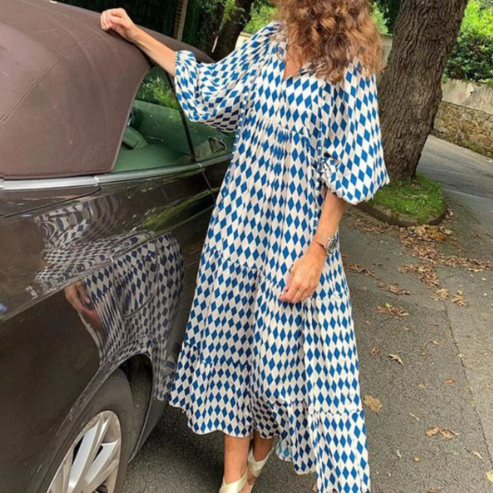"Elegante bohemian jurk met geometrisch patroon, wijde mouwen, ideaal voor dames, zomers trendy en ademend ontwerp."