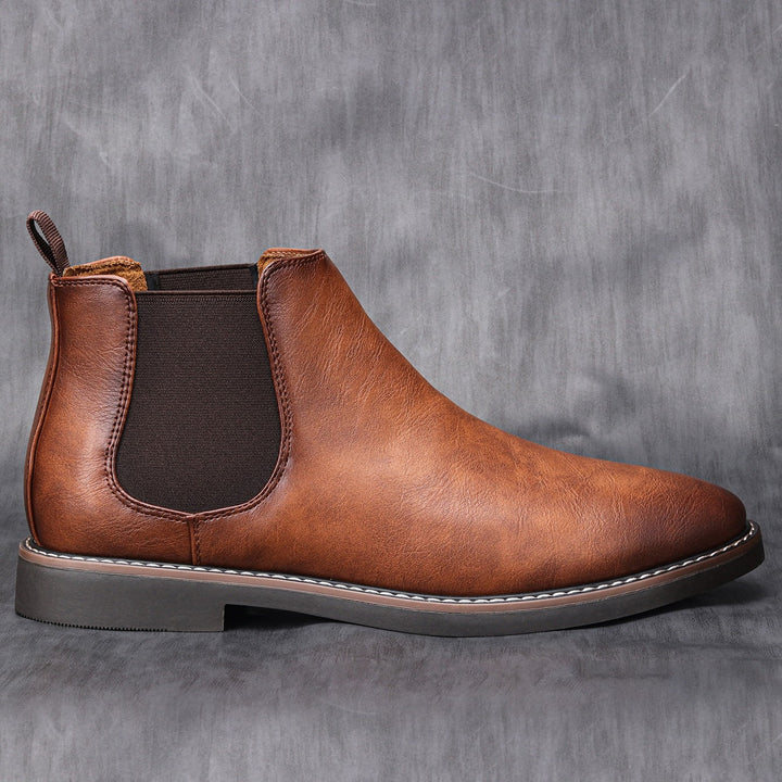 "Elegante Chelsea leren herenlaarzen met glad leer en elastische zijkanten voor superieur comfort en stijlvolle uitstraling."