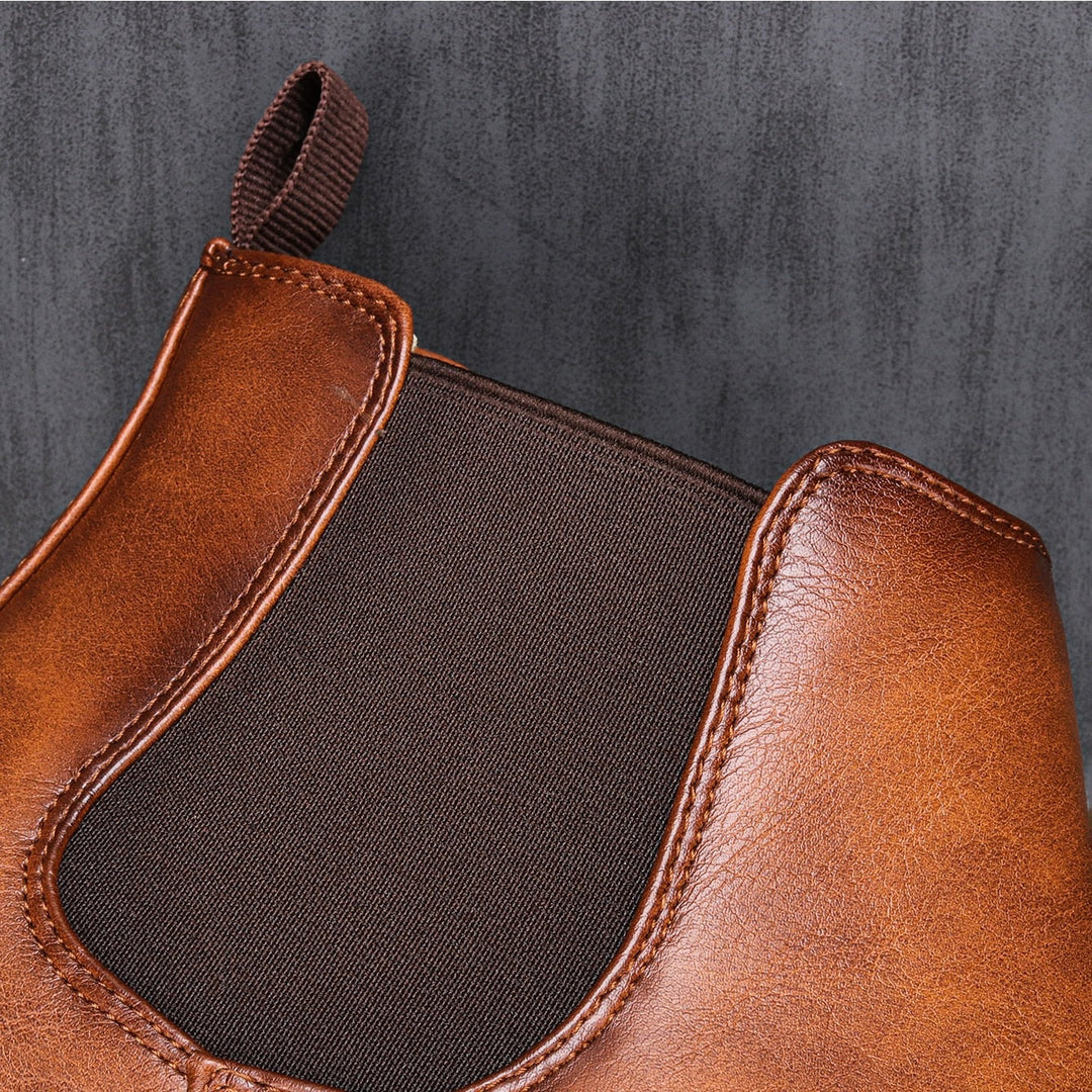 "Elegante Chelsea leren herenlaarzen met glad leer en elastische zijkanten voor superieur comfort en stijlvolle uitstraling."