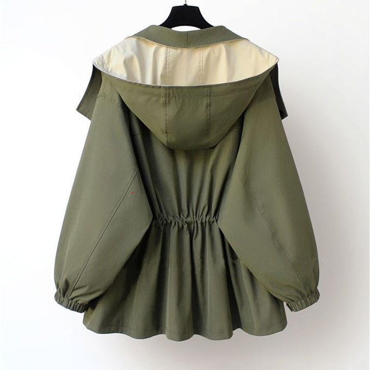 "Elegante dames winter trenchcoat, lange jas met dubbele kraag en weerbestendige afwerking."