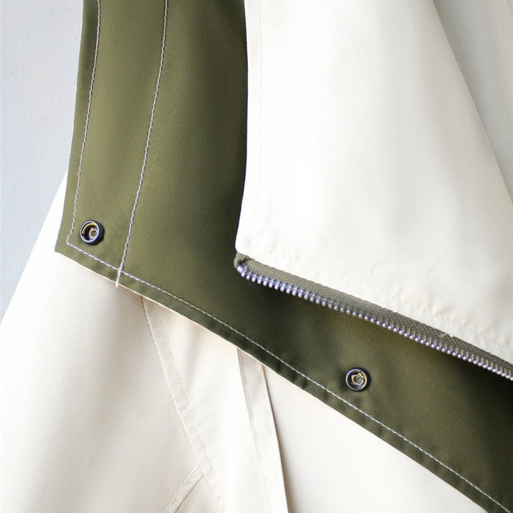 "Elegante dames winter trenchcoat, lange jas met dubbele kraag en weerbestendige afwerking."
