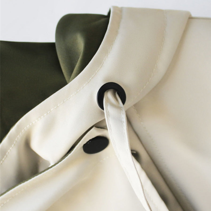 "Elegante dames winter trenchcoat, lange jas met dubbele kraag en weerbestendige afwerking."