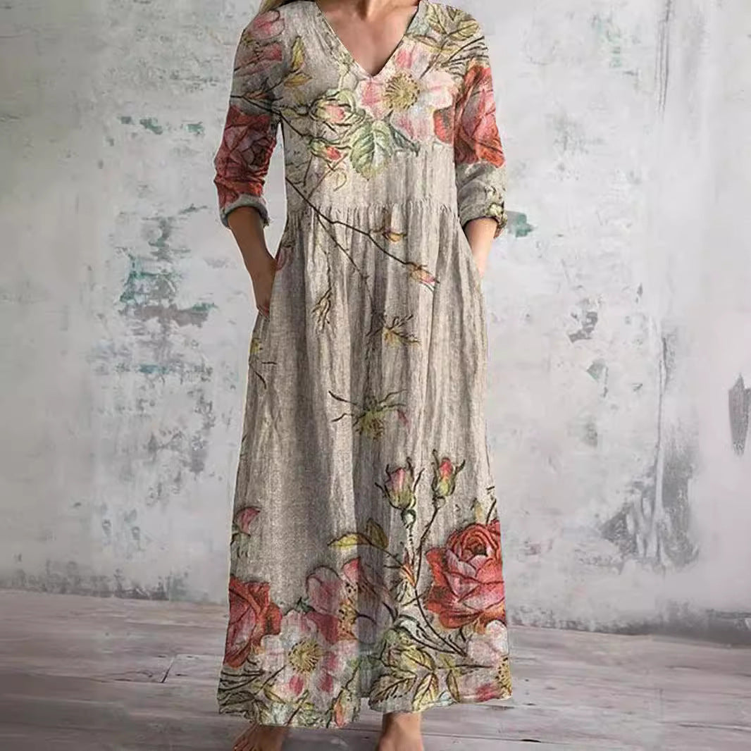 "Elegante dames zomerjurk met levendige bloemenprint, luchtige stof, voorzijde weergave, ideaal voor warme dagen."