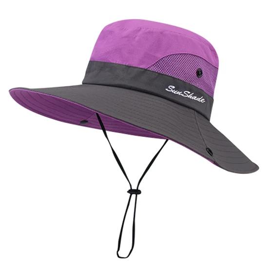 "Elegante dameshoed met brede rand, UV-bescherming in blauwe en roze tinten, ideaal voor zonnige dagen."