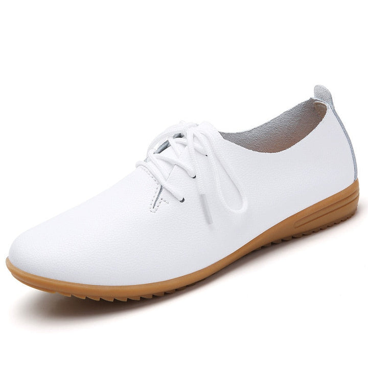 "Elegante damesnette schoen, beige, verfijnd design, comfortabele pasvorm, ideaal voor kantoor of avondje uit."