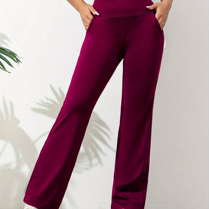 "Elegante elastische dames yogabroek in effen donkerblauw, ademend en comfortabel, met elastische tailleband voor yoga"