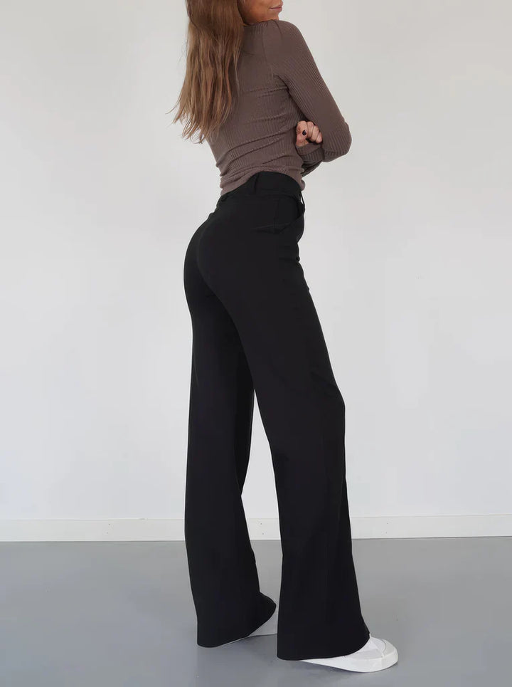 "Elegante grijze damesbroek met slim-fit en wijde pijpen van duurzame polyester voor zowel casual als formele looks."