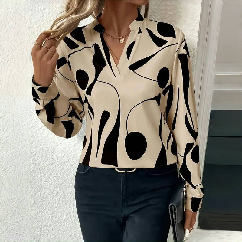 "Elegante Izora blouse dames, ademende stoffen, tijdloos ontwerp, stijlvolle accenten, flatterende pasvorm."