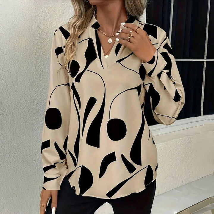 "Elegante Izora blouse dames, ademende stoffen, tijdloos ontwerp, stijlvolle accenten, flatterende pasvorm."