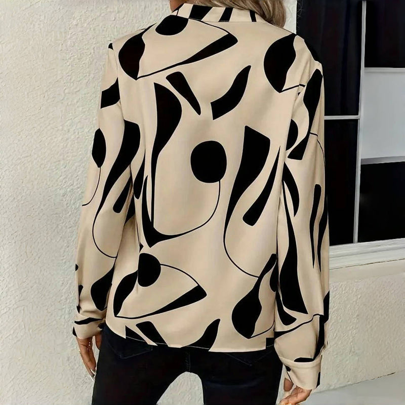 "Elegante Izora blouse dames, ademende stoffen, tijdloos ontwerp, stijlvolle accenten, flatterende pasvorm."
