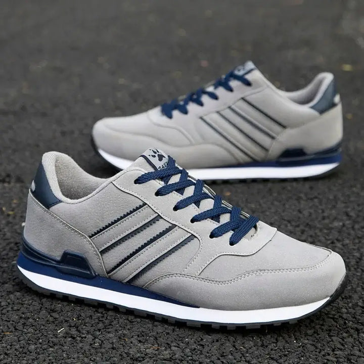 "Elegante klassieke herensneakers in blauw, grijs en zwart, stijlvol ontwerp voor casual en chique looks, comfortabel en veel