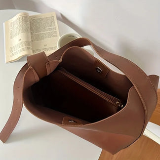 "Elegante leren dames tas, tijdloos design, hand- en schoudertas, premium leer, veelzijdige draagopties"