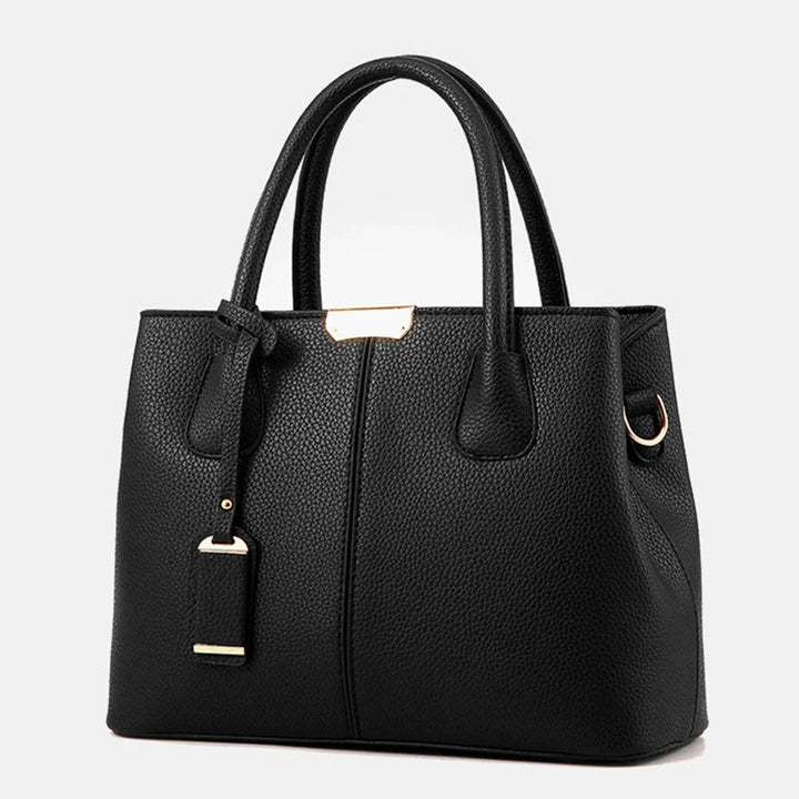 Elegante leren schoudertas voor dames, stijlvol en ruim, met verstelbare riem en verschillende kleurkeuzes.