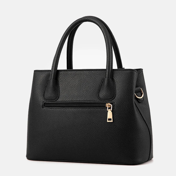 Elegante leren schoudertas voor dames, stijlvol en ruim, met verstelbare riem en verschillende kleurkeuzes.