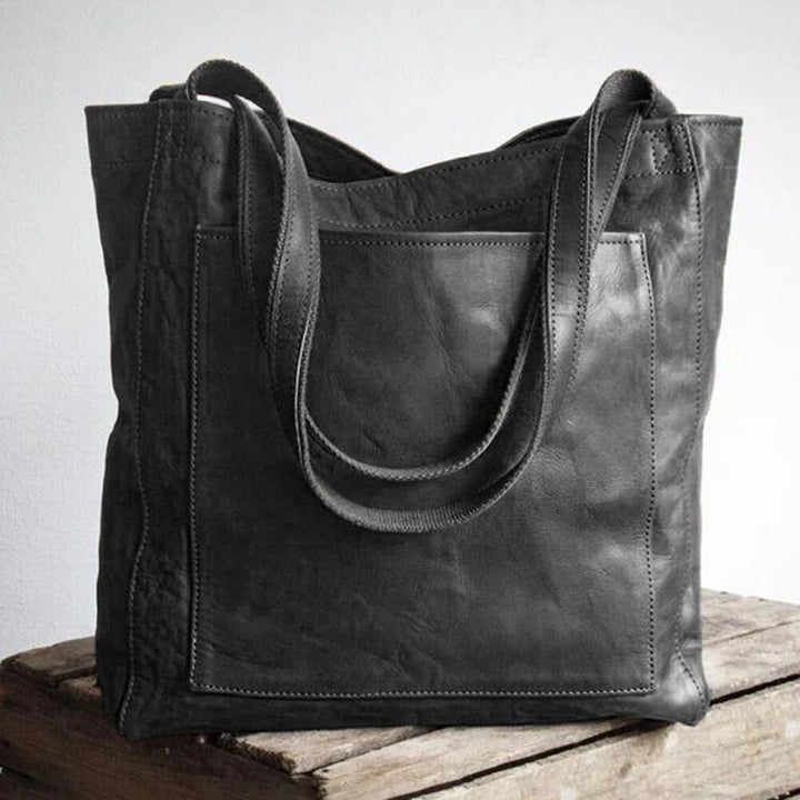 Elegante, leren tas voor dames, chique uitstraling, vlekbestendig interieur, perfecte toevoeging aan elke garderobe.
