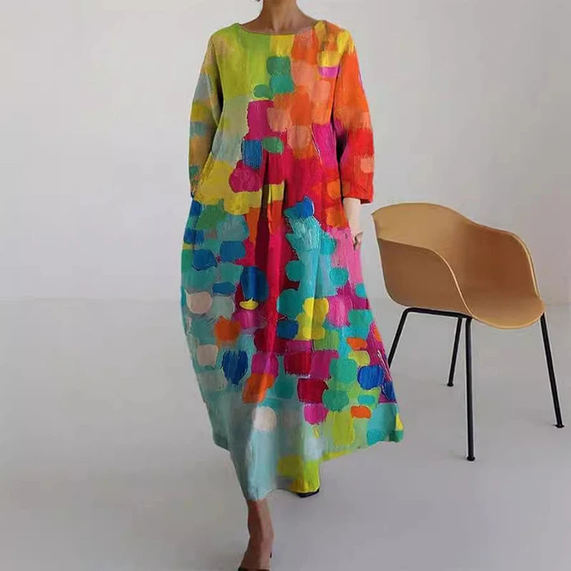 "Elegante maxi jurk met abstracte bloemenprint, bohemian stijl, lange mouwen, zakken, V-hals, perfect voor zomerdagen."