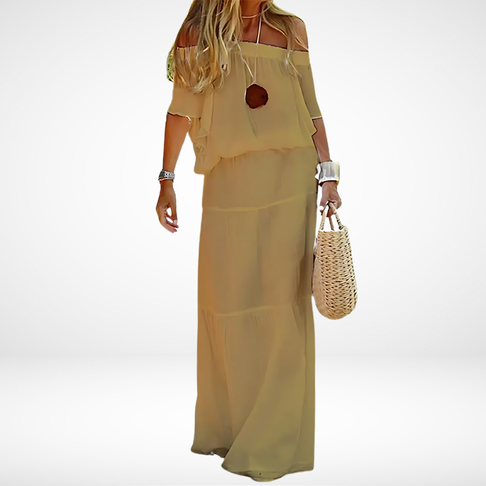 "Elegante maxi strandjurk in boho stijl, off-shoulder met V-hals en vetersluiting, luchtige chiffonstof."
