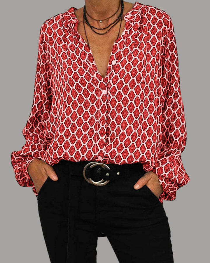 "Elegante Mireille blouse dames met V-hals en geometrisch patroon, lange mouwen, ideaal voor elke stijl en gelegenheid."