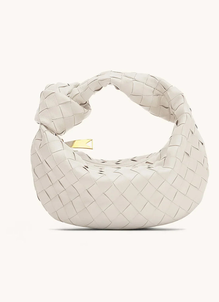 "Elegante Noré Venta luxe handtas van Italiaans kalfsleer, tijdloos design, handgestikt, met meerdere compartimenten."