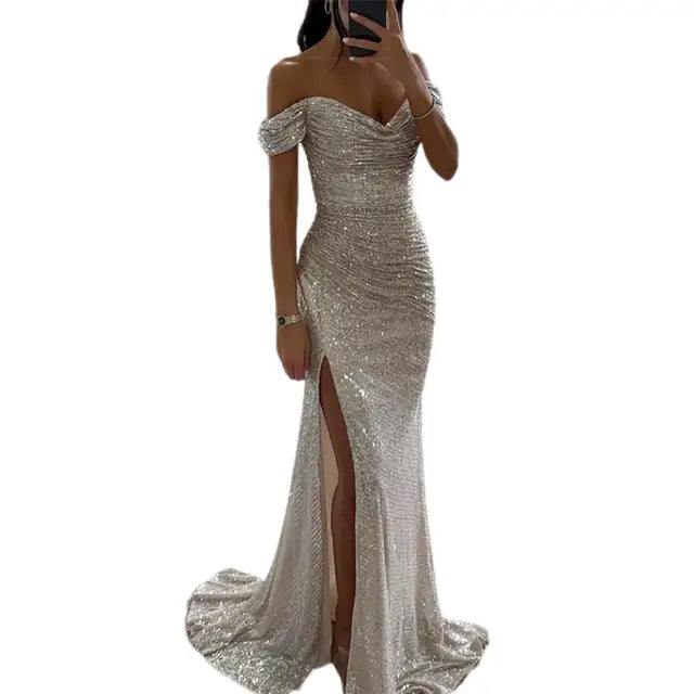 Elegante off-shoulder avondjurk met V-hals, maxi-lengte, verkrijgbaar in blauw, champagne, rood, zilver en zwart.