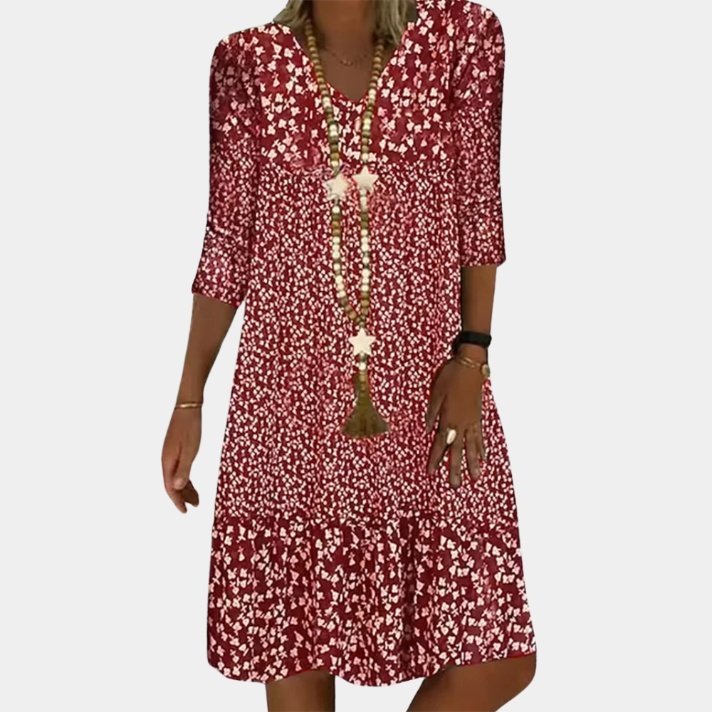 Elegante Paloma midi-jurk dames met V-hals, A-lijn, driekwart mouwen en luchtige print, ideaal voor zomerse dagen.
