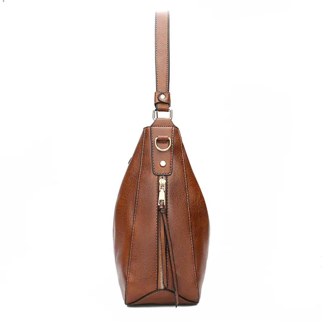 "Elegante rode hobo tas voor dames met vintage charme, ruim interieur, ideaal voor dagelijks gebruik in stijl."
