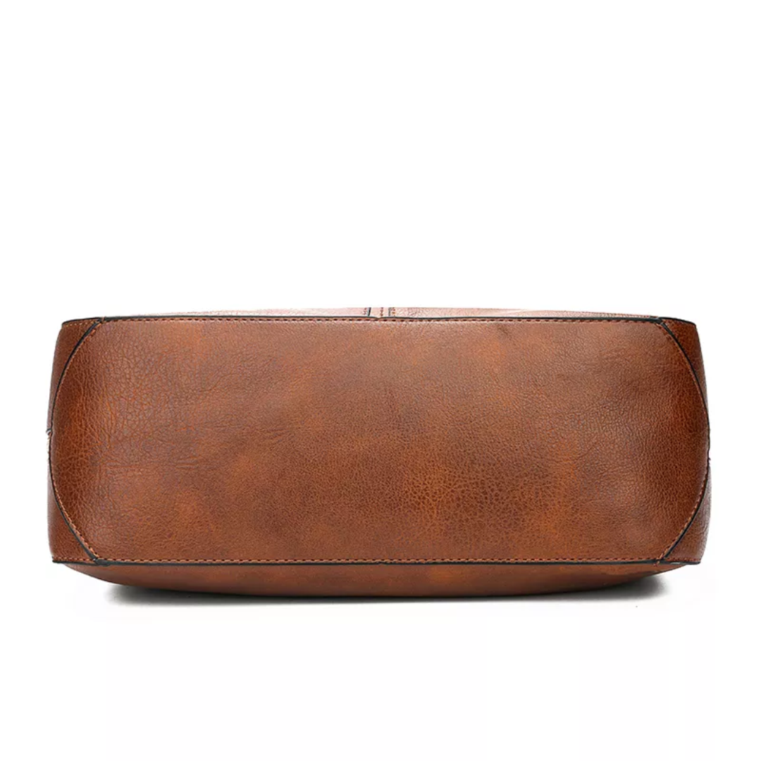 "Elegante rode hobo tas voor dames met vintage charme, ruim interieur, ideaal voor dagelijks gebruik in stijl."