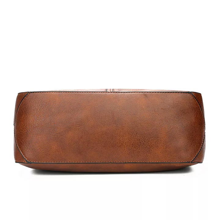 "Elegante rode hobo tas voor dames met vintage charme, ruim interieur, ideaal voor dagelijks gebruik in stijl."