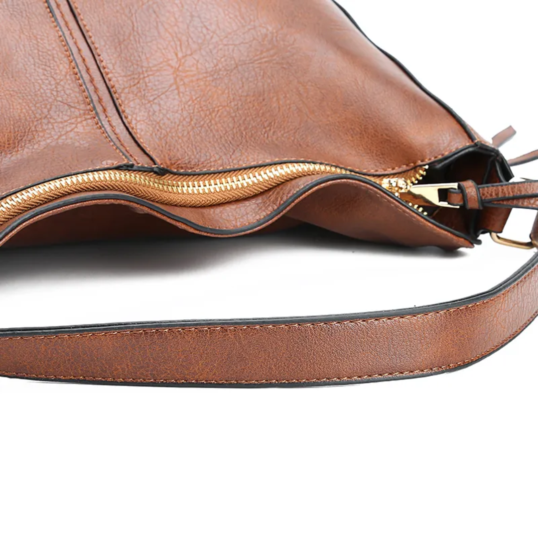 "Elegante rode hobo tas voor dames met vintage charme, ruim interieur, ideaal voor dagelijks gebruik in stijl."