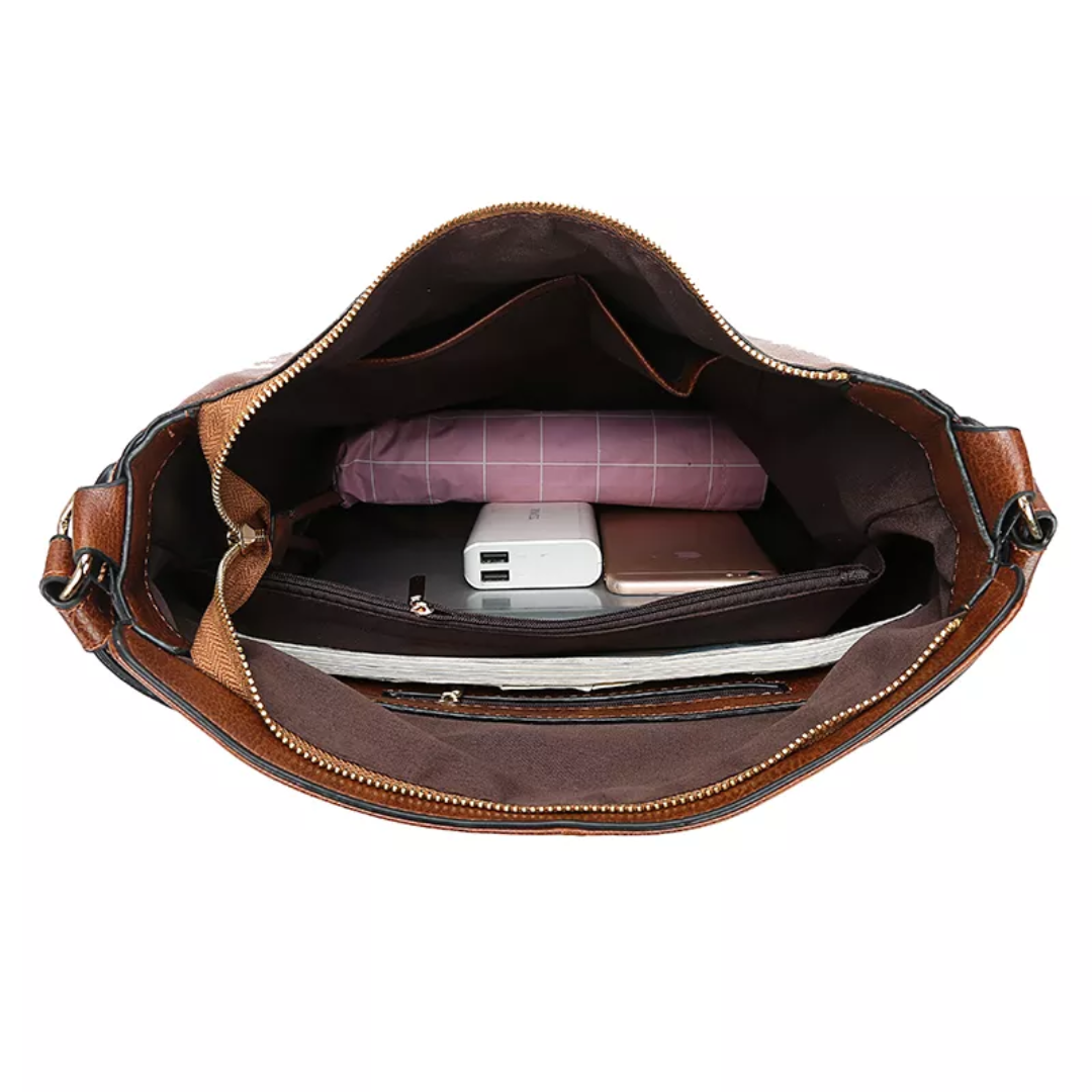 "Elegante rode hobo tas voor dames met vintage charme, ruim interieur, ideaal voor dagelijks gebruik in stijl."