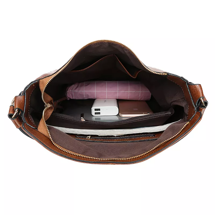 "Elegante rode hobo tas voor dames met vintage charme, ruim interieur, ideaal voor dagelijks gebruik in stijl."