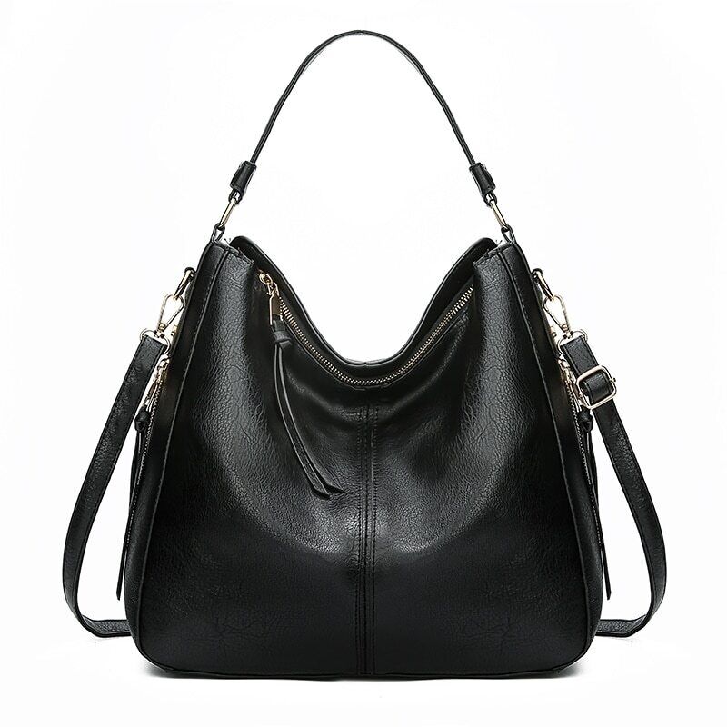 "Elegante rode hobo tas voor dames met vintage charme, ruim interieur, ideaal voor dagelijks gebruik in stijl."