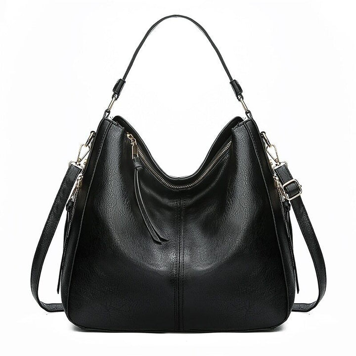 "Elegante rode hobo tas voor dames met vintage charme, ruim interieur, ideaal voor dagelijks gebruik in stijl."